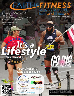 Image of two people running in a marathon. One is holding an American flag.
